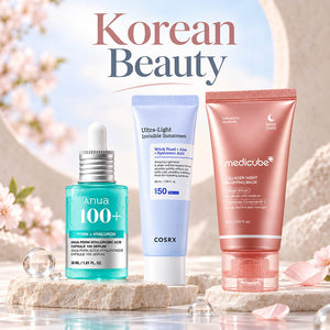 Korean Beauty promotional banner featuring COSRX Aloe Soothing Sun Cream SPF50+, Anua Heartleaf Pore Control Cleansing Oil, and Beauty of Joseon Relief Sun Rice + Probiotics sunscreen on stone display.